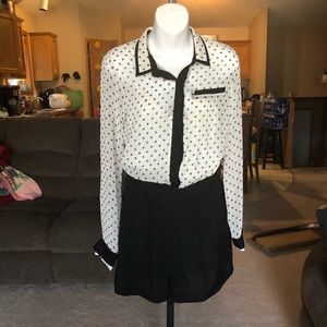 Cream and black romper. Used